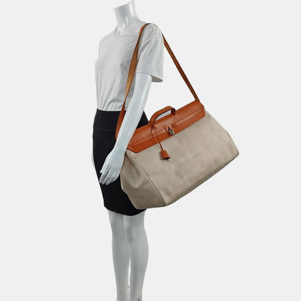 Authenticated pre-owned  Herbag Coated Canvas White - Shoulder Bag at Looply