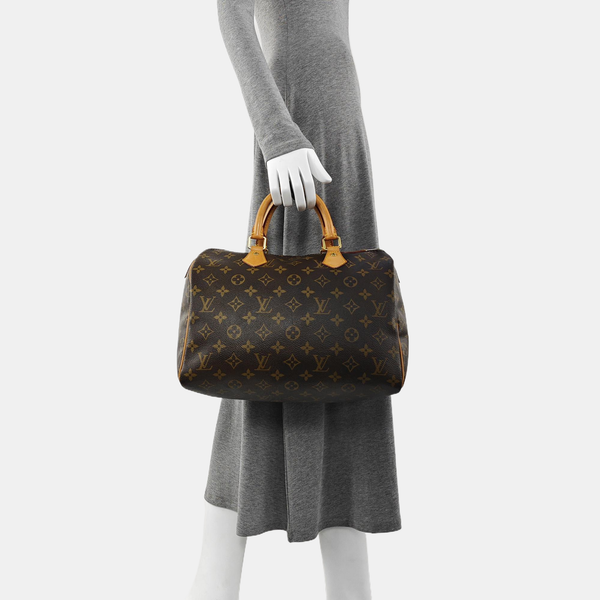 Authenticated pre-owned  SPEEDY 30 Monogram Coated Canvas Brown - Top Handle Bag at Looply