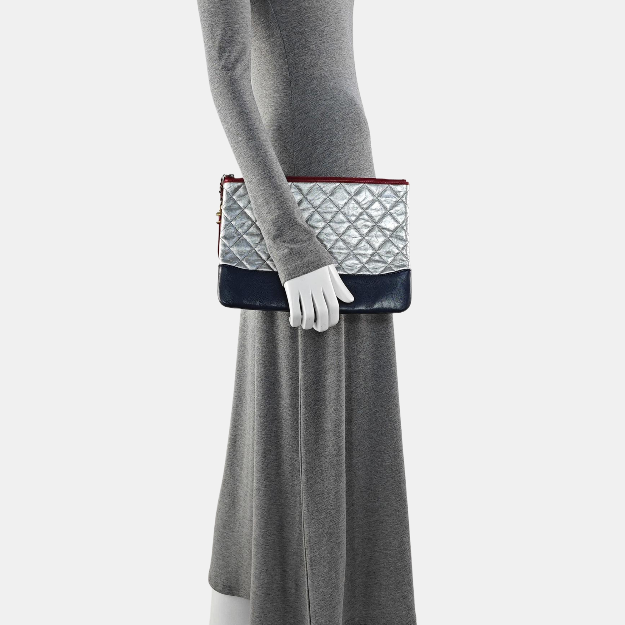 Authenticated pre-owned  GABRIELLE Calfskin Silver - Clutch at Looply