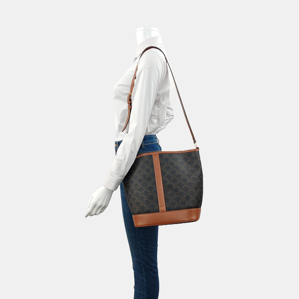Authenticated pre-owned  TRIOMPHE CANVAS Medium Coated Canvas Yellow - Bucket Bag at Looply