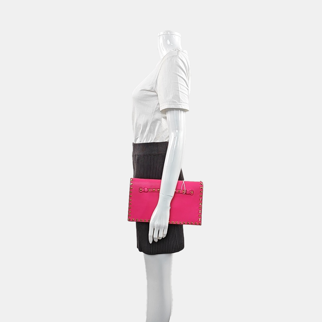 Authenticated pre-owned  Rockstud Lambskin Pink - Clutch at Looply