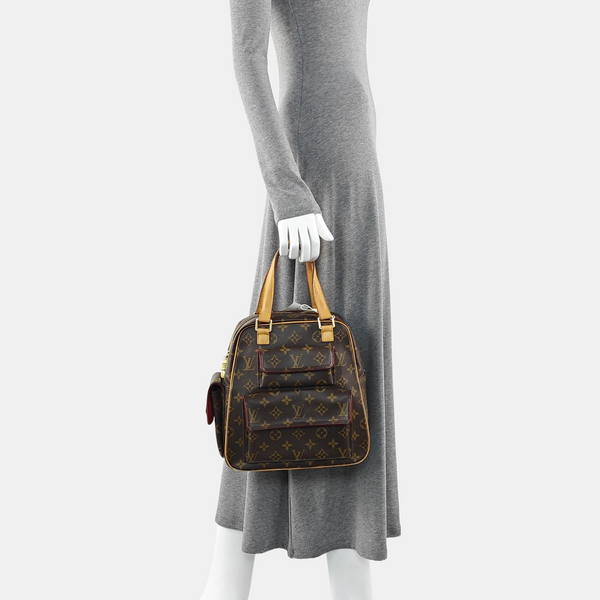 EXCENTRI-CITE Monogram Coated Canvas Brown