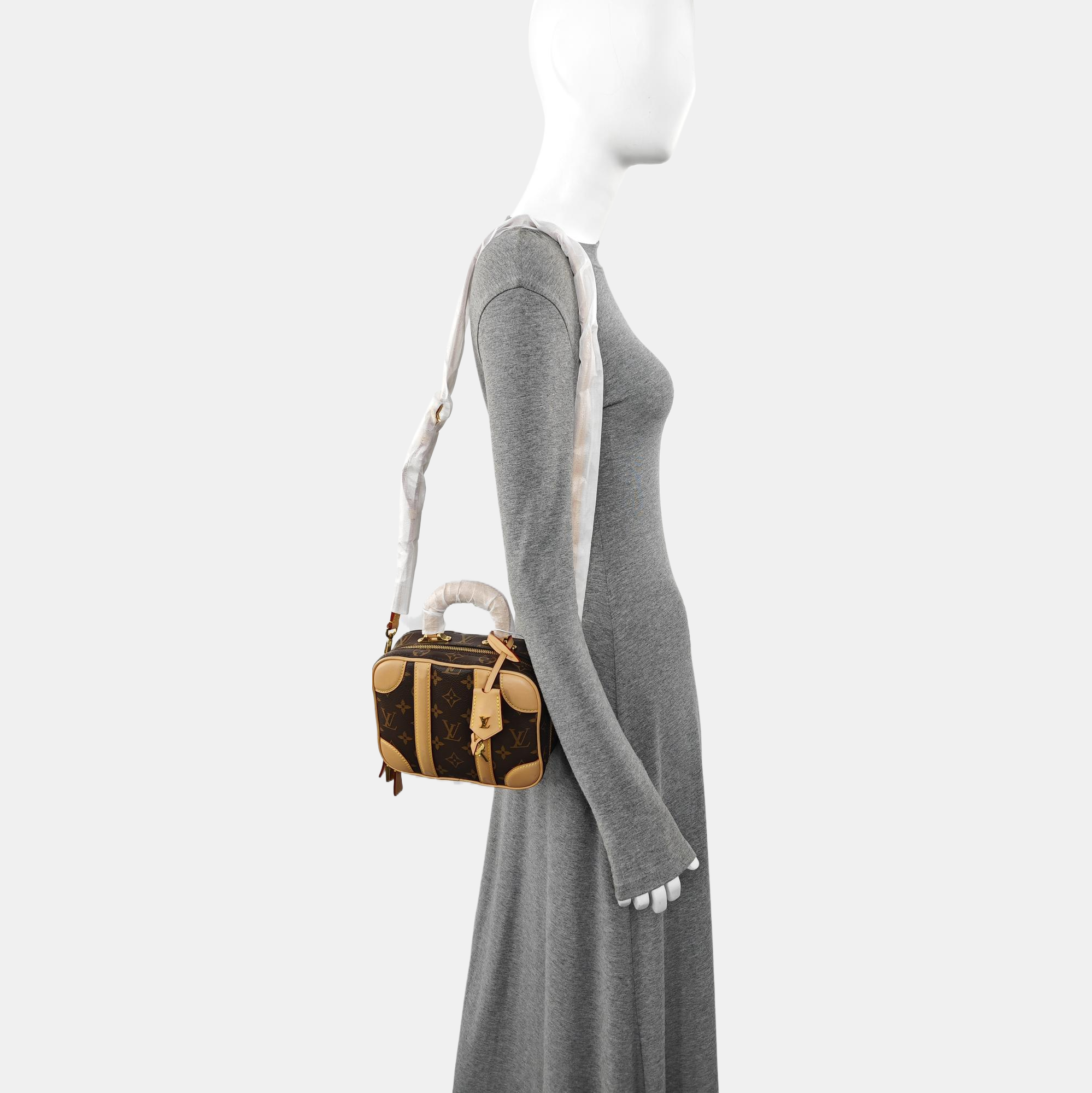 LUGGAGE Monogram Coated Canvas Brown