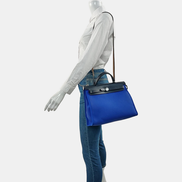 Authenticated pre-owned  Herbag 31 Canvas Blue - Shoulder Bag at Looply