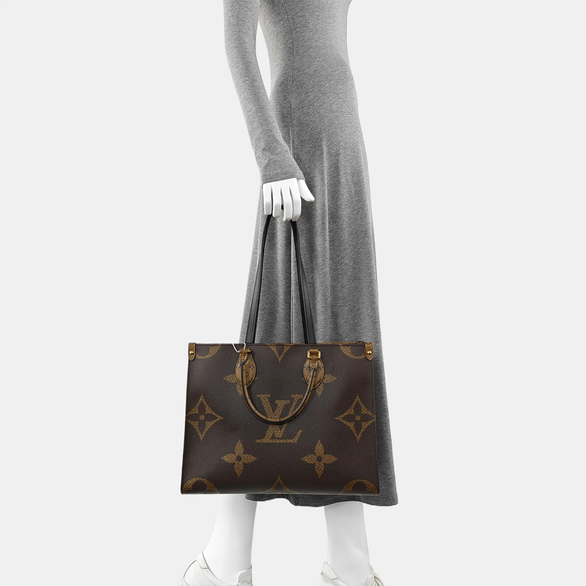 ONTHEGO MM Monogram Coated Canvas Brown