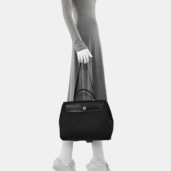Authenticated pre-owned  Herbag 31 Canvas Black - Shoulder Bag at Looply