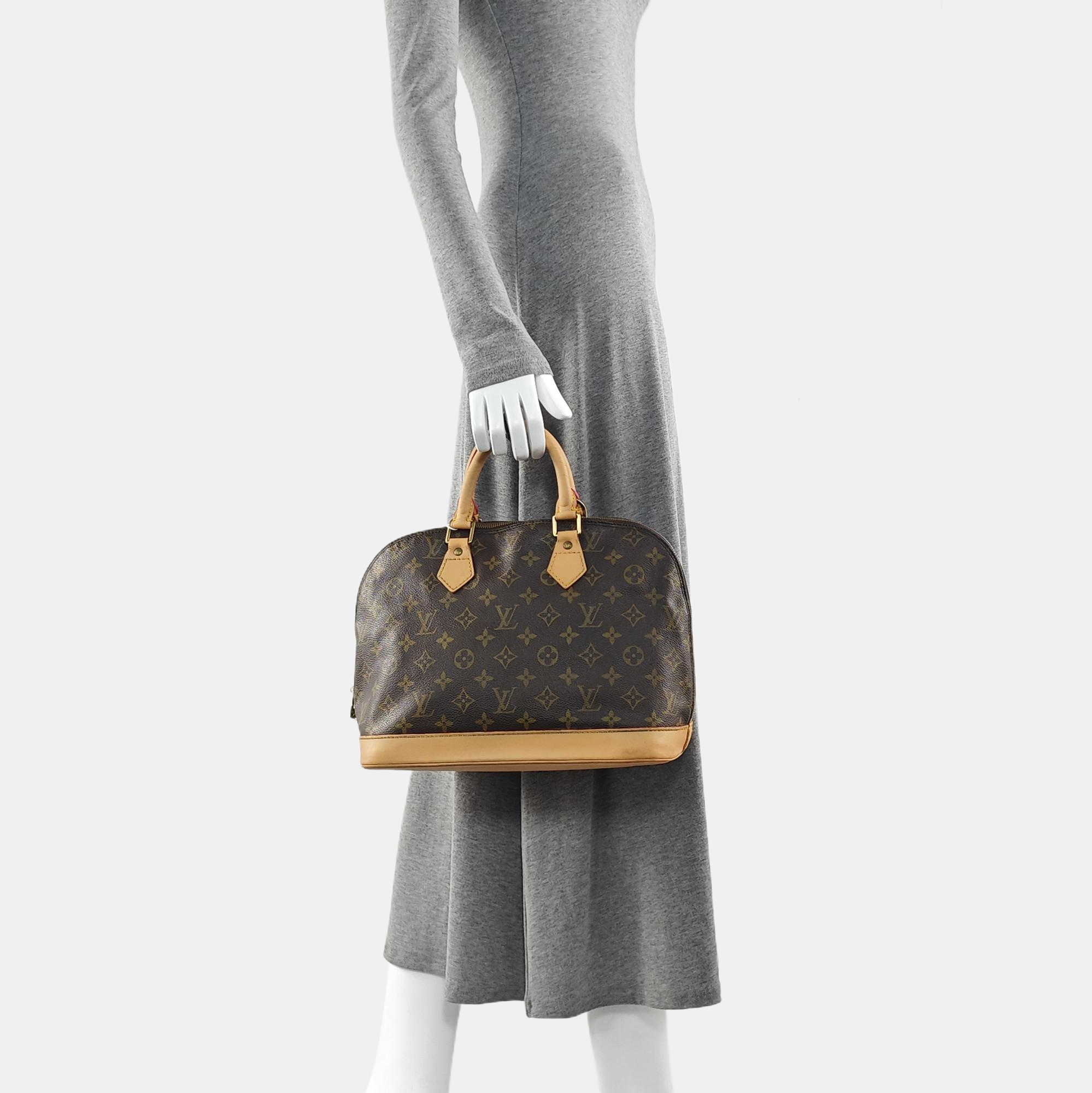 ALMA PM Monogram Coated Canvas Brown