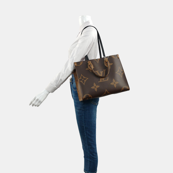 ONTHEGO MM Monogram Coated Canvas Brown