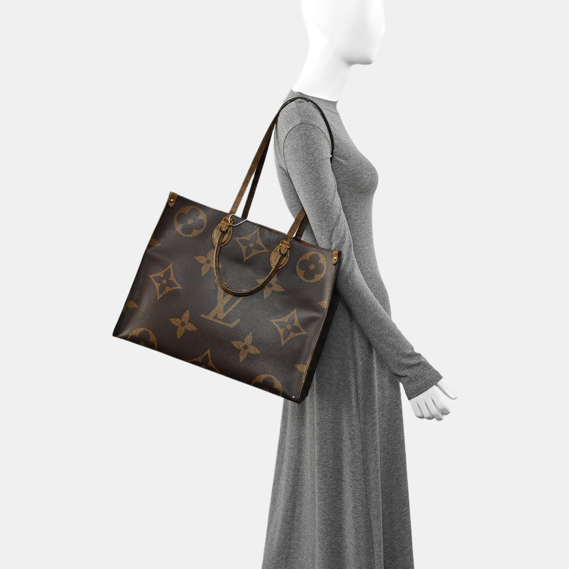 ONTHEGO GM Monogram Coated Canvas Brown