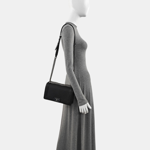 Authenticated pre-owned  BOY CHANEL Chevron, Quilted Calfskin Black - Shoulder Bag at Looply