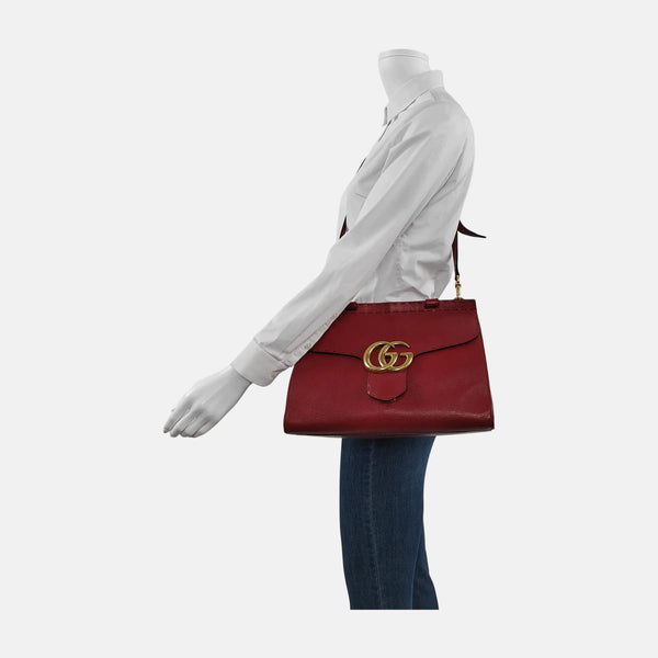 Authenticated pre-owned  GG Marmont Top Handle Small Calfskin Red - Shoulder Bag at Looply