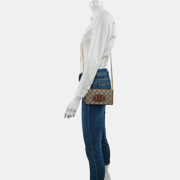 Authenticated pre-owned  Horsebit 1955 WOC Monogram Coated Canvas Beige - Shoulder Bag at Looply