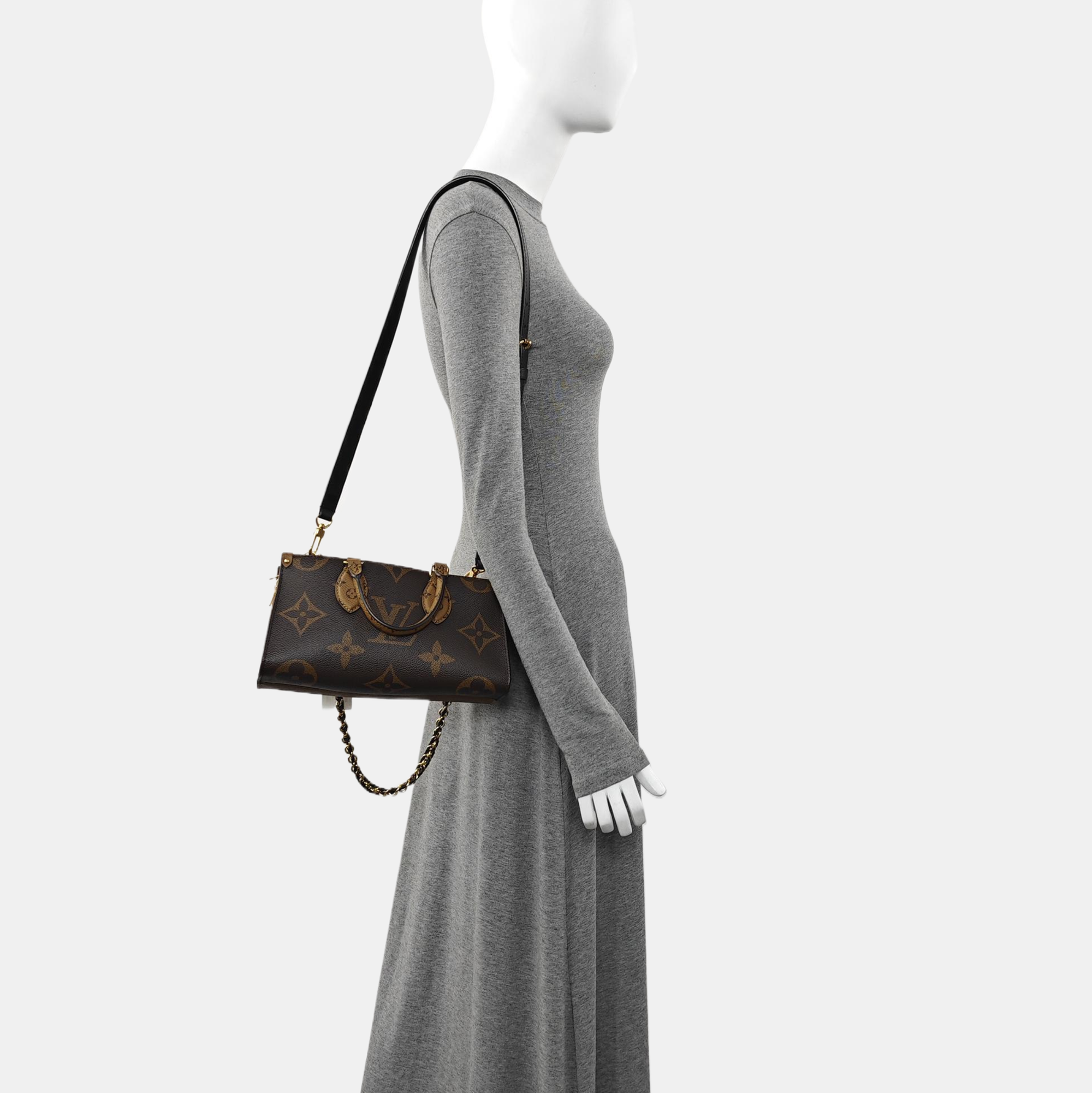 ONTHEGO EAST WEST PM Monogram Coated Canvas Brown