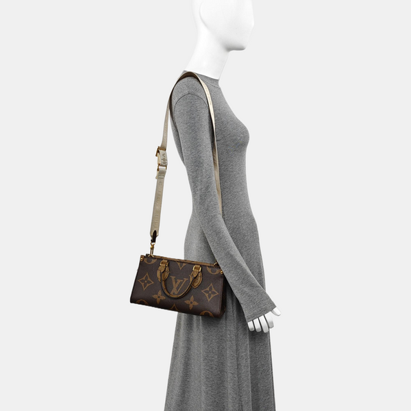 ONTHEGO EAST WEST PM Monogram Coated Canvas Brown