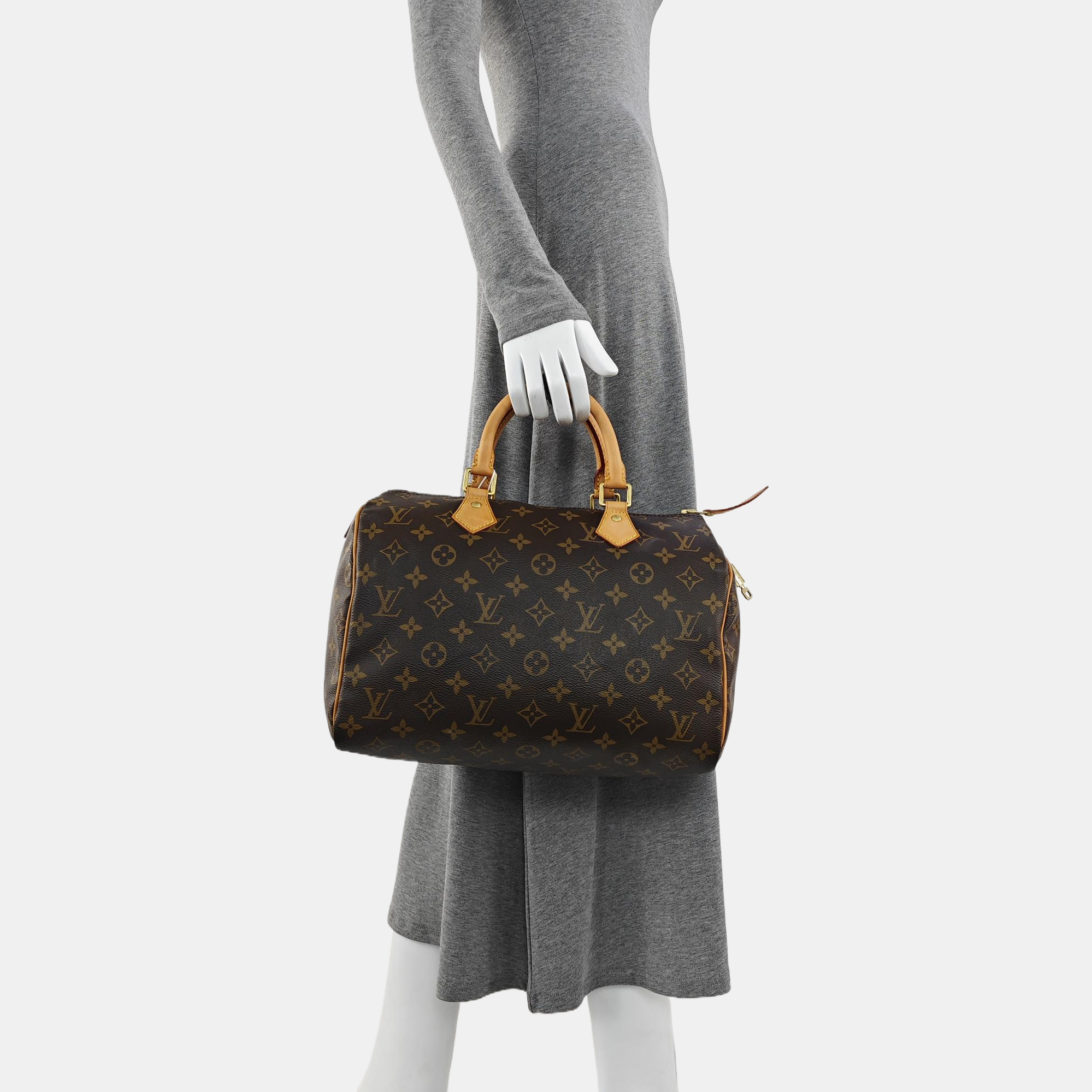 Authenticated pre-owned  SPEEDY 30 Monogram Coated Canvas Brown - Top Handle Bag at Looply