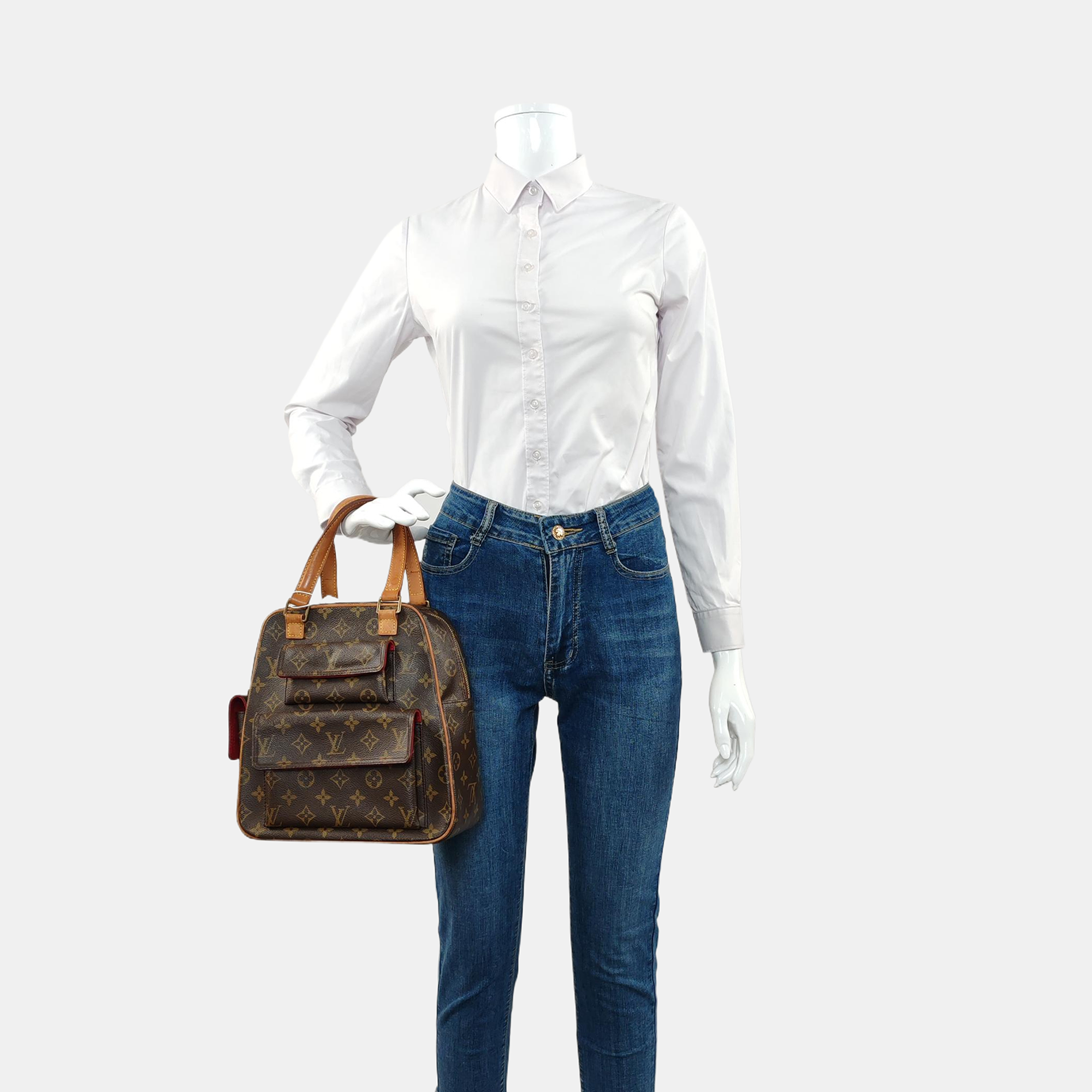 EXCENTRI-CITE Monogram Coated Canvas Brown