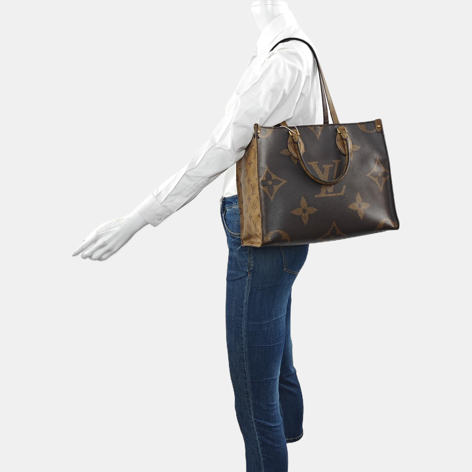 ONTHEGO MM Monogram Coated Canvas Brown
