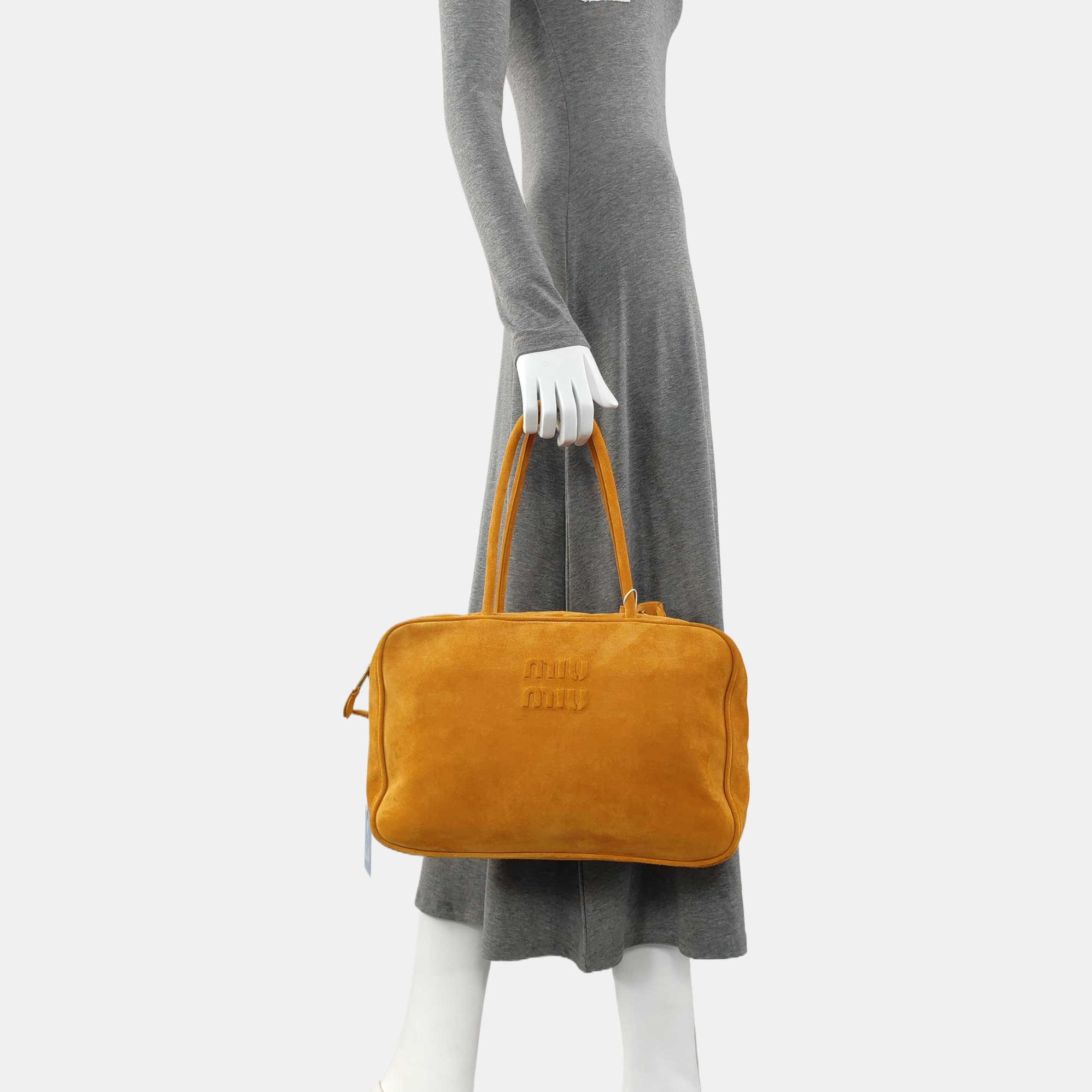 Authenticated pre-owned  Beau Suede Yellow - Top Handle Bag at Looply