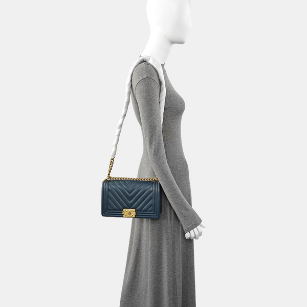 Authenticated pre-owned  BOY CHANEL Medium Chevron, Quilted Grained Calfskin Blue - Shoulder Bag at Looply
