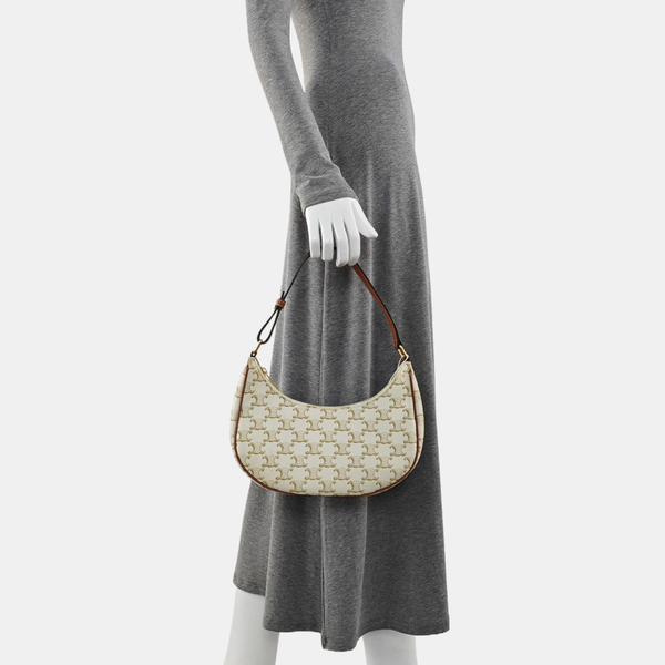 Authenticated pre-owned  AVA Coated Canvas Beige - Top Handle Bag at Looply
