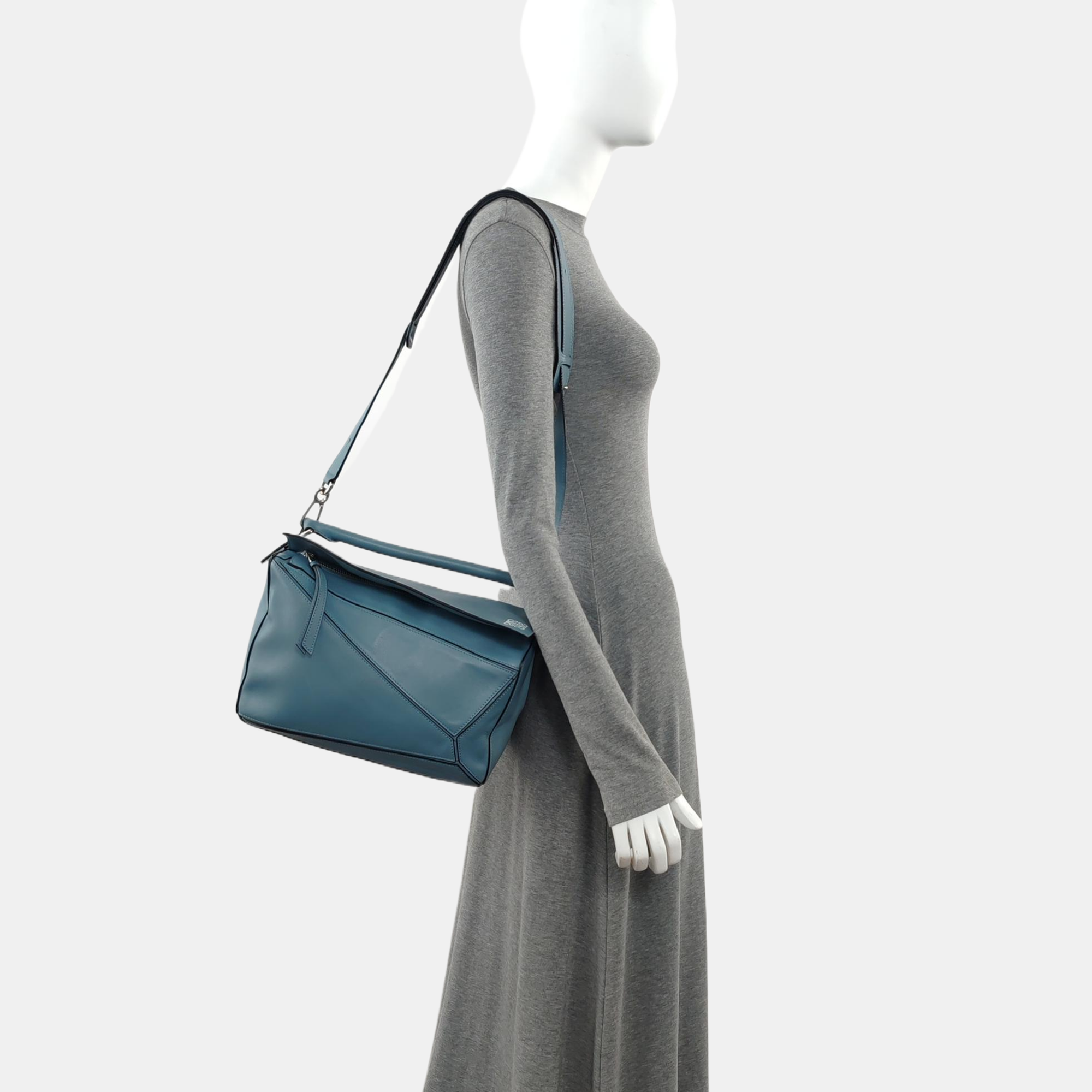 Authenticated pre-owned  Puzzle Medium Calfskin Blue - Crossbody Bag at Looply