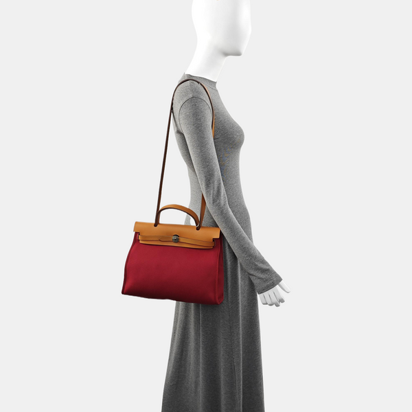 Authenticated pre-owned  Herbag 31 Canvas Red - Shoulder Bag at Looply