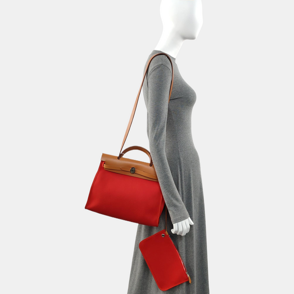 Authenticated pre-owned  Herbag 31 Canvas Red - Shoulder Bag at Looply