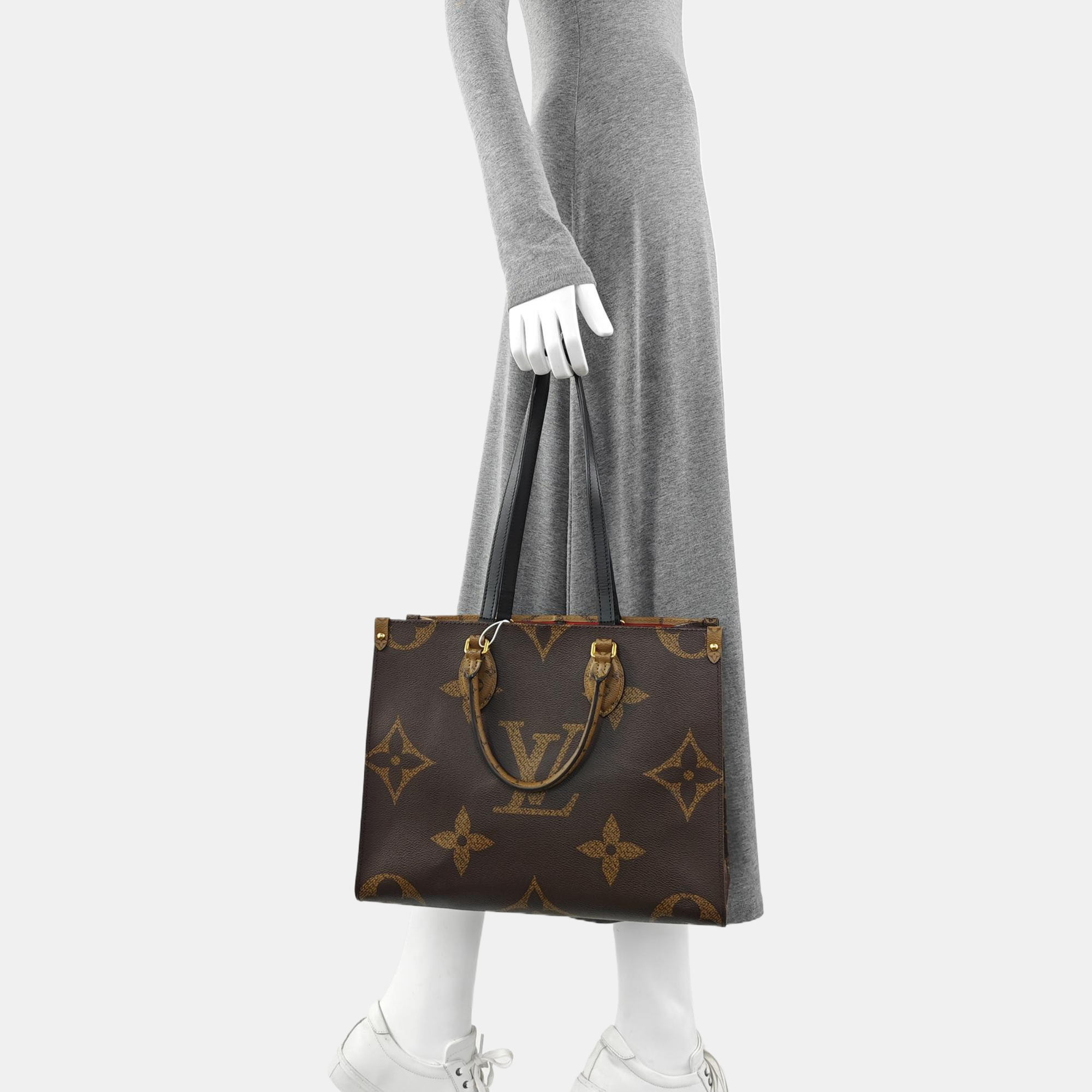 ONTHEGO MM Monogram Coated Canvas Brown