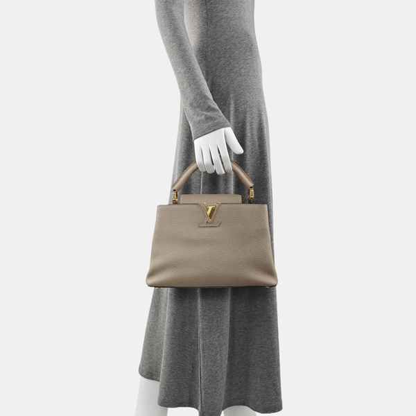 Authenticated pre-owned  CAPUCINES BB Calfskin Grey - Shoulder Bag at Looply