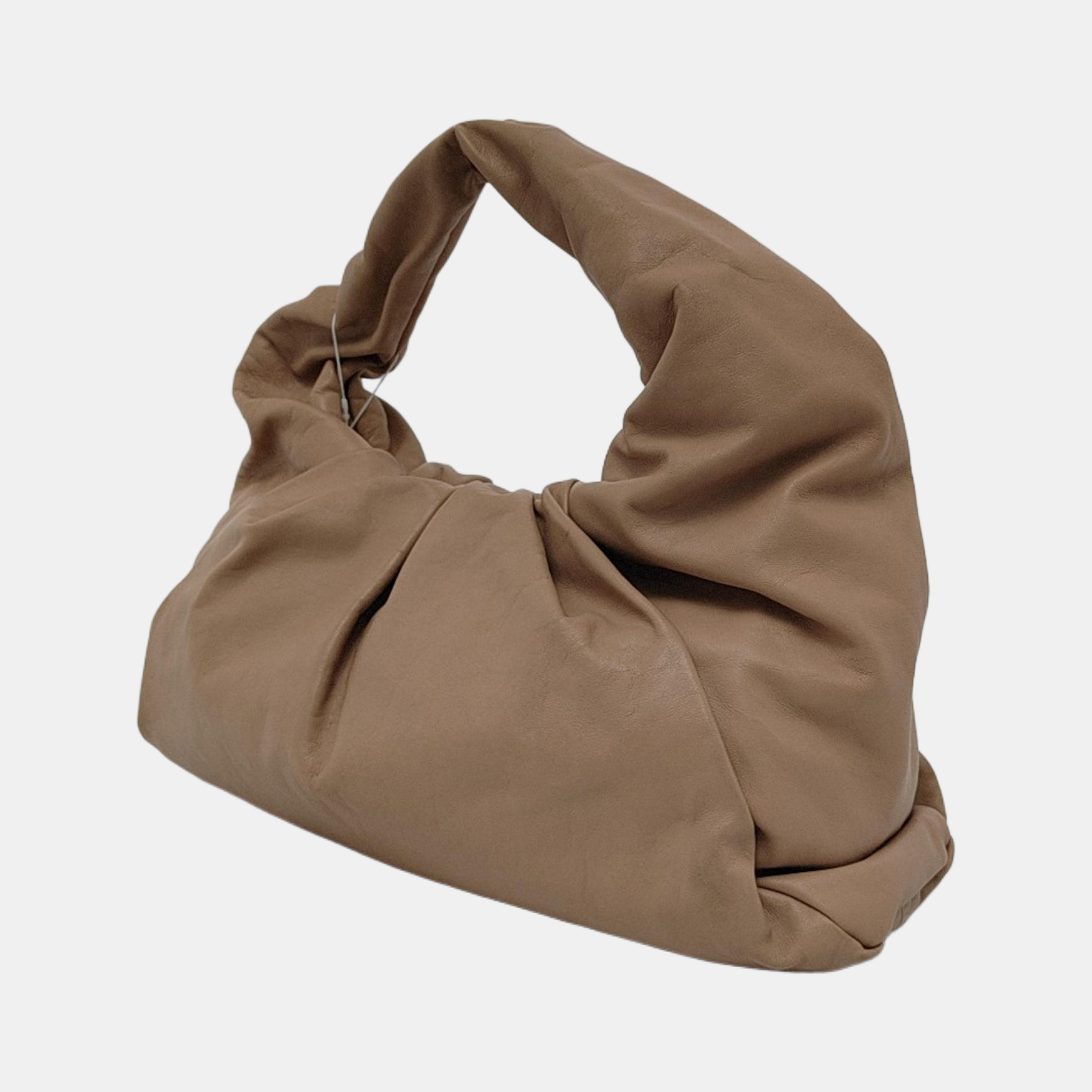 La funda de piel de becerro marrón