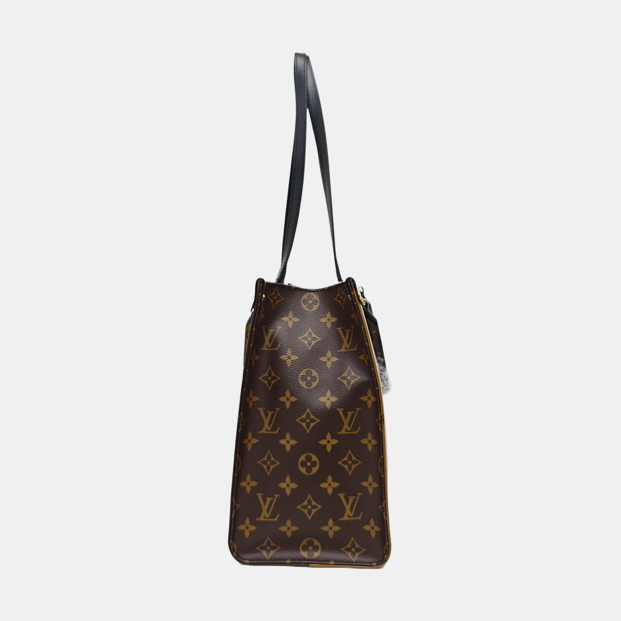 ONTHEGO MM Monogram Coated Canvas Brown