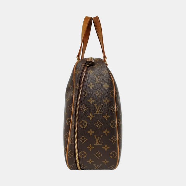 EXCURSION Monogram Coated Canvas Brown