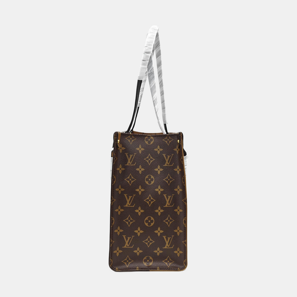 ONTHEGO MM Monogram Coated Canvas Brown