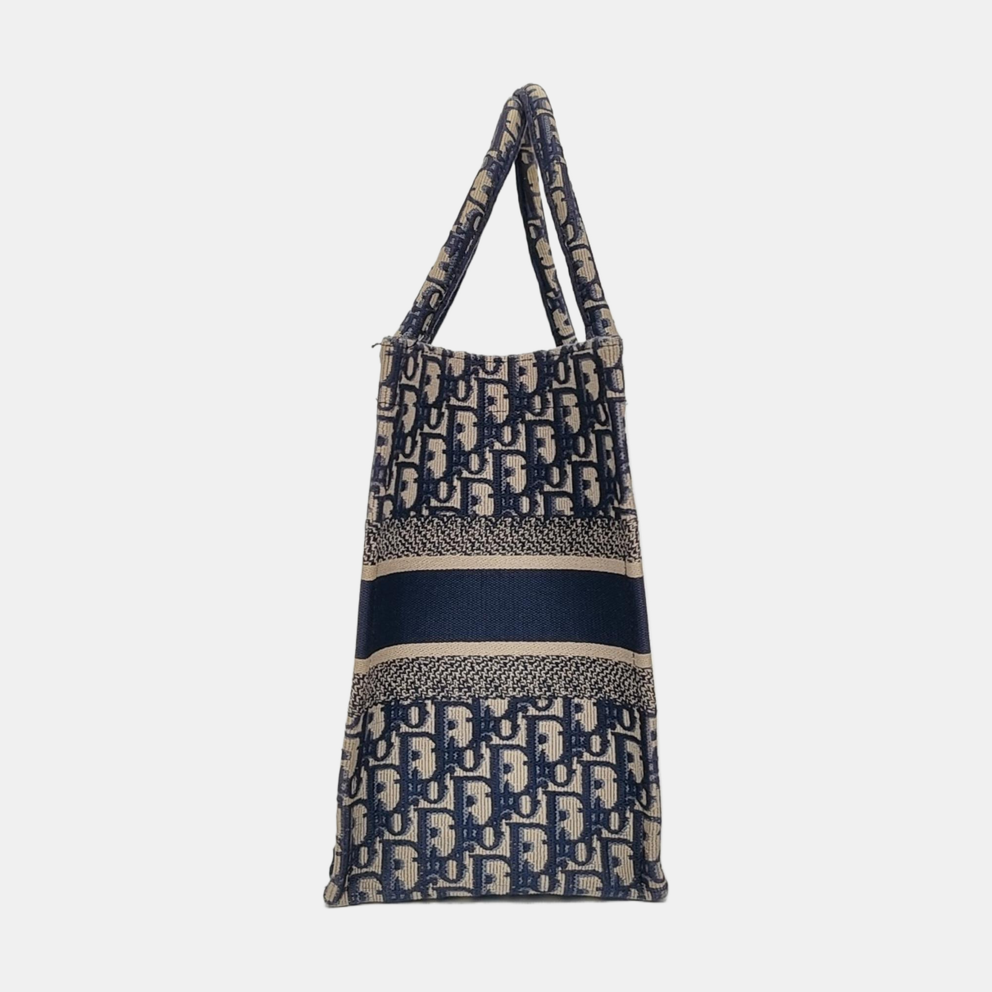 Authenticated pre-owned  Book Tote Medium Monogram Canvas Blue - Tote Bag at Looply