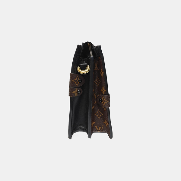 TRUNK Monogram Coated Canvas Brown