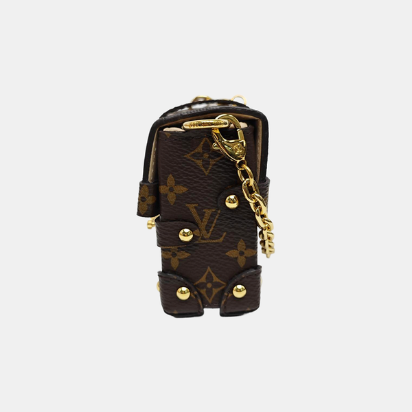 TRUNK Monogram Coated Canvas Brown