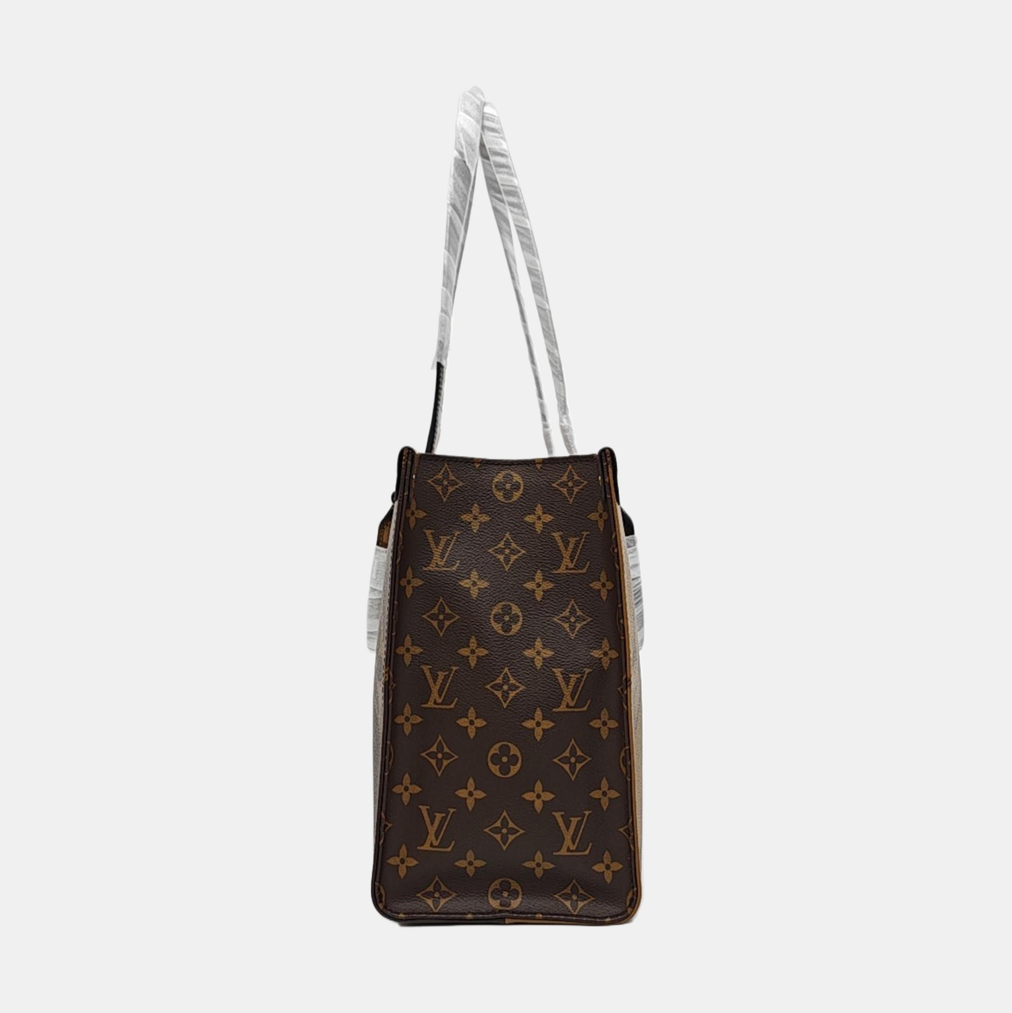 ONTHEGO MM Monogram Coated Canvas Brown