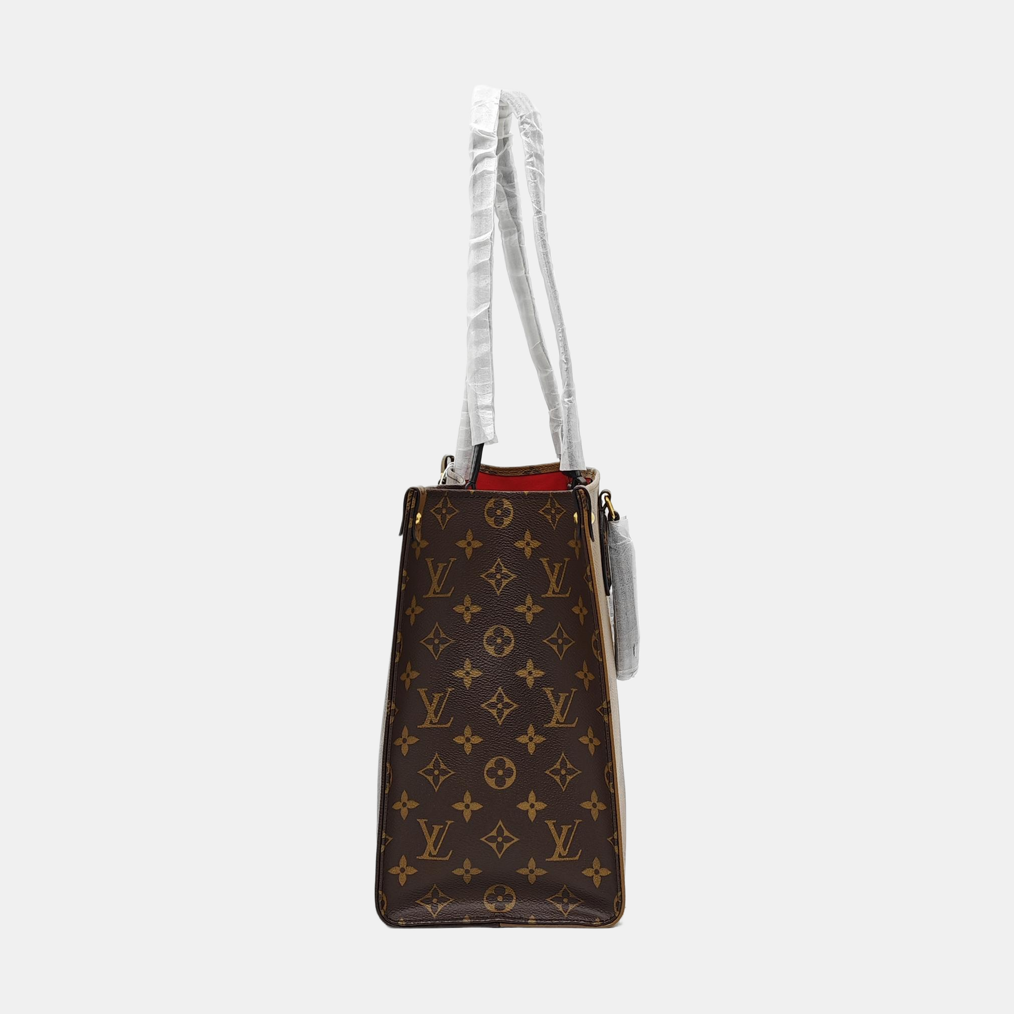 ONTHEGO MM Monogram Coated Canvas Brown