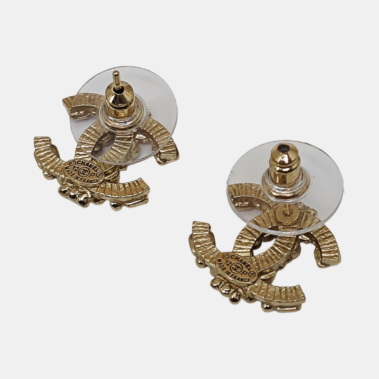 Pendientes CC en tono dorado, metal, otros dorados