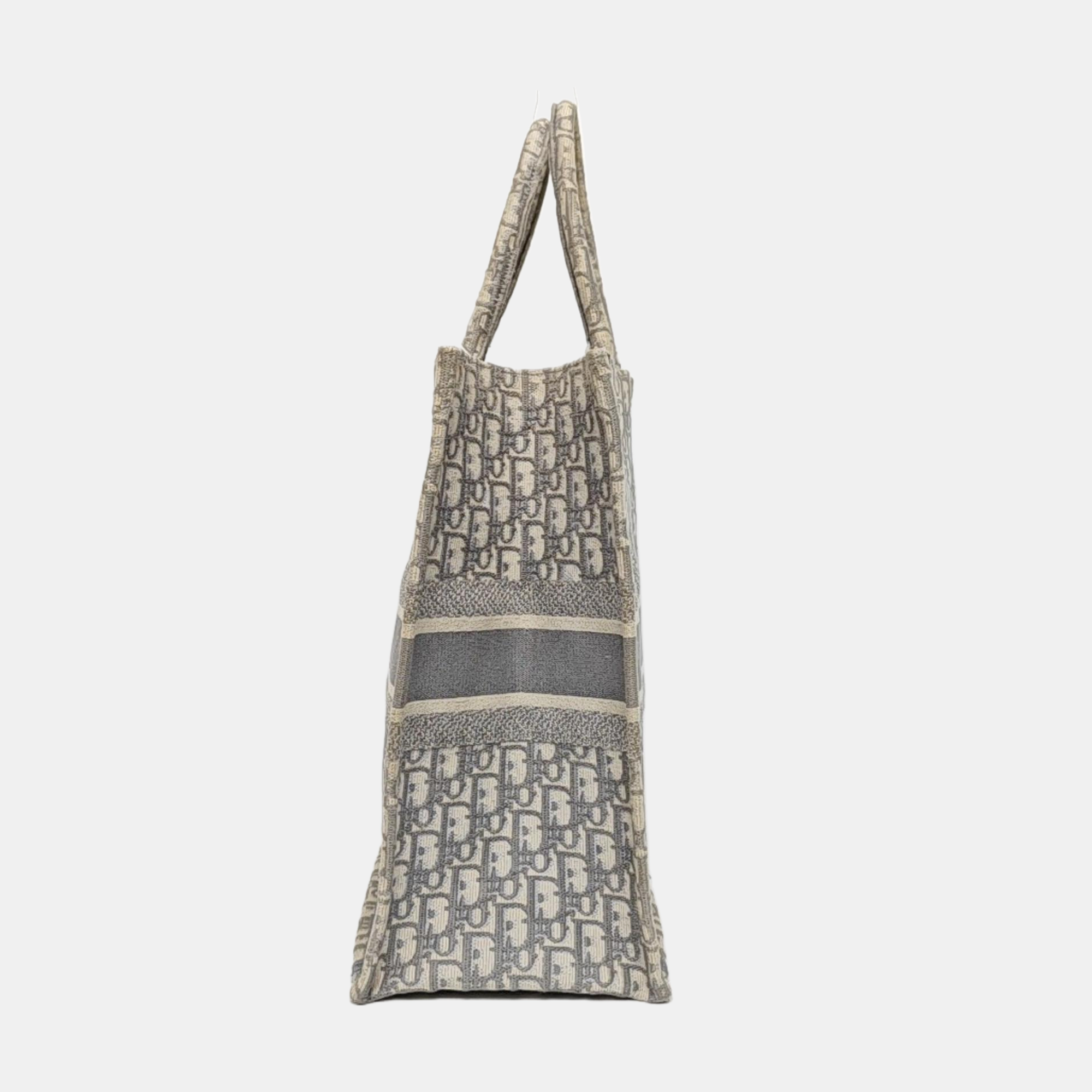 Authenticated pre-owned  Book Tote Large Monogram Canvas Grey - Tote Bag at Looply