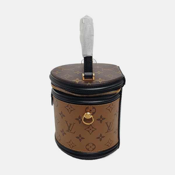 CANNES PM Monogram Coated Canvas Brown