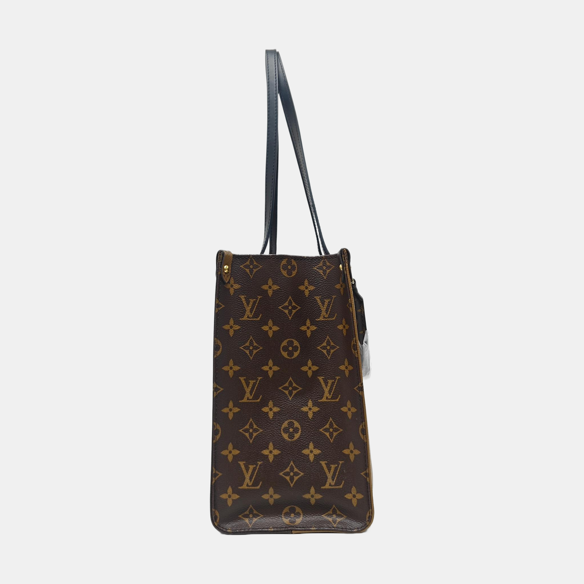 ONTHEGO MM Monogram Coated Canvas Brown
