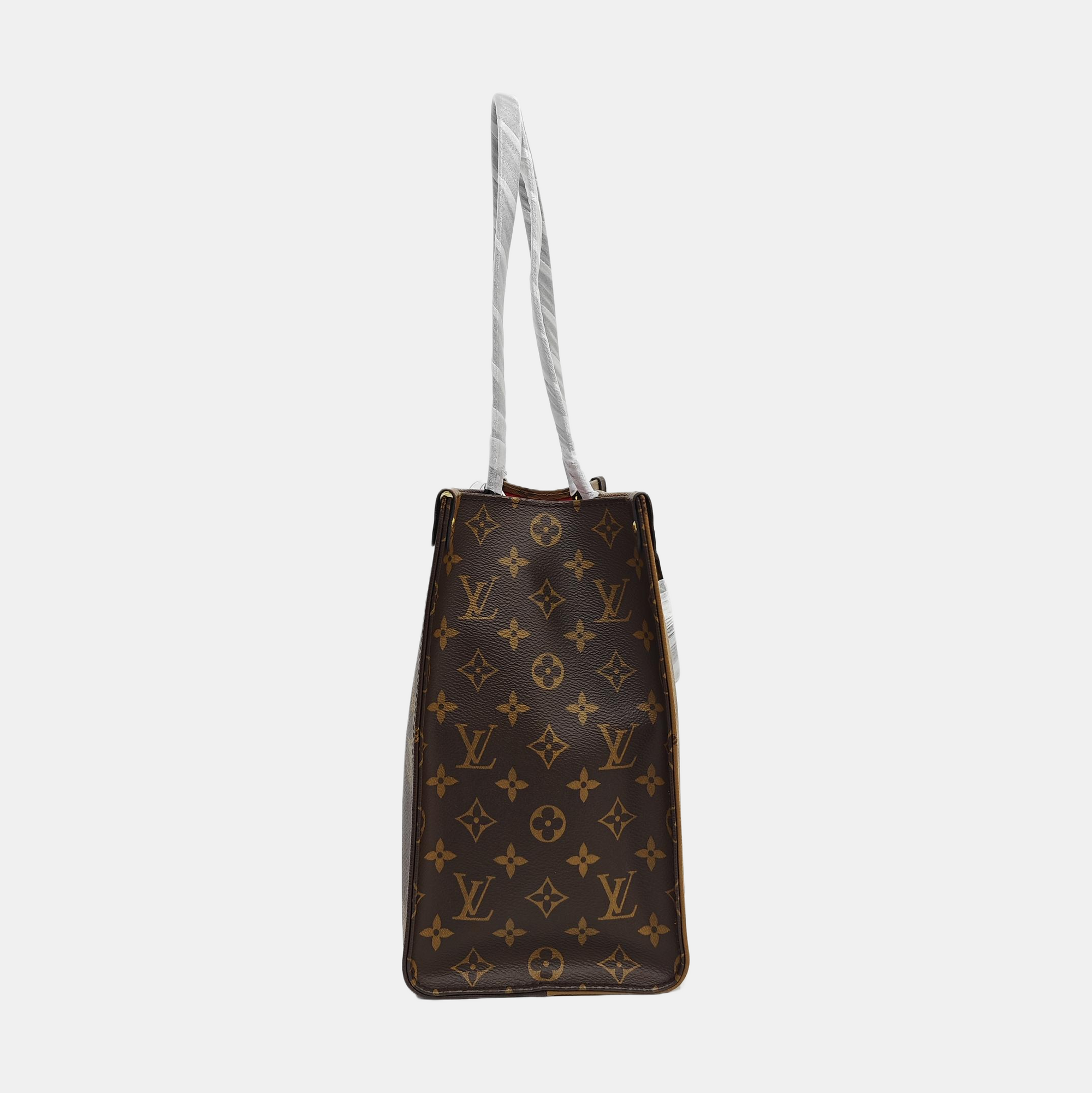 ONTHEGO MM Monogram Coated Canvas Brown