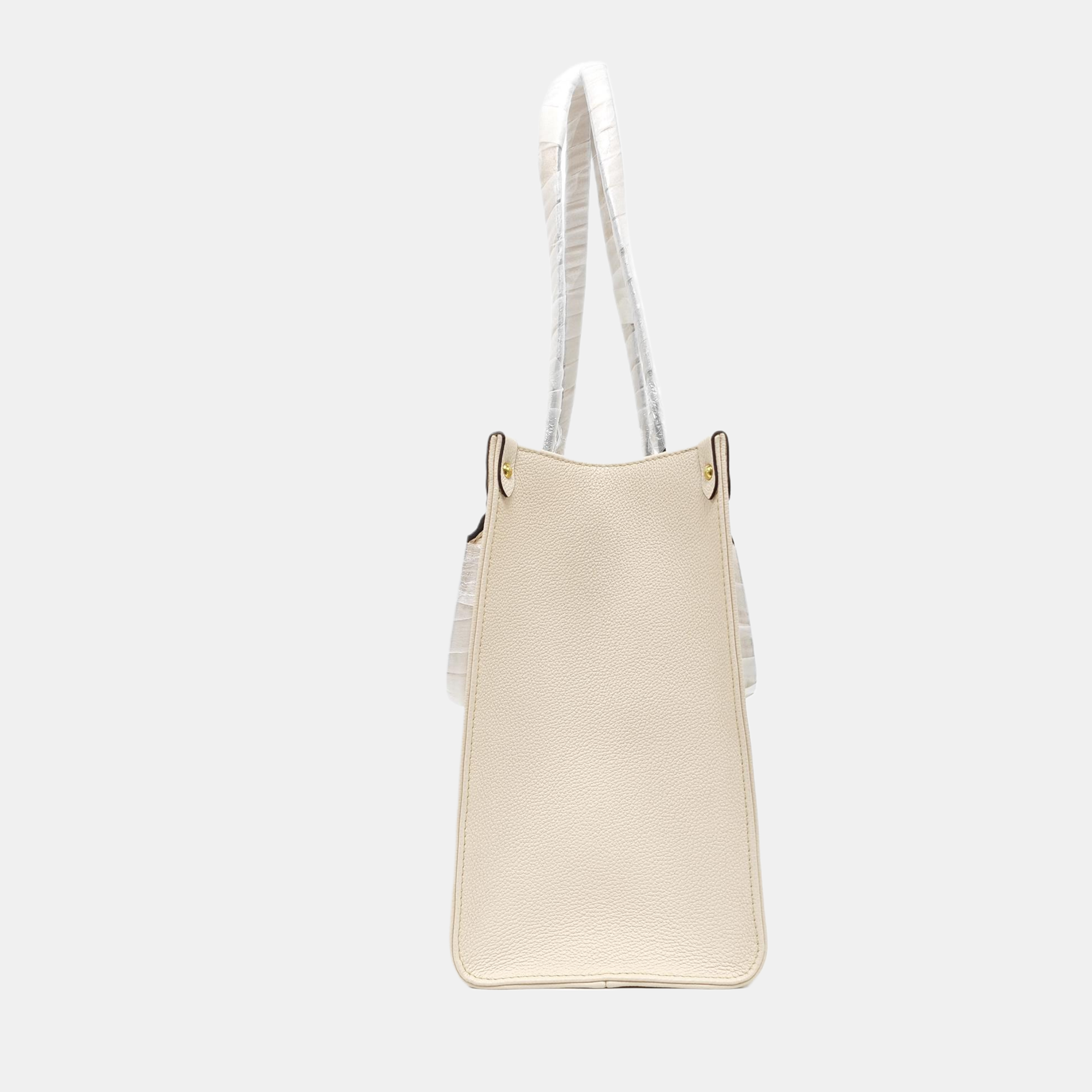 ONTHEGO MM Monogram Calfskin Beige