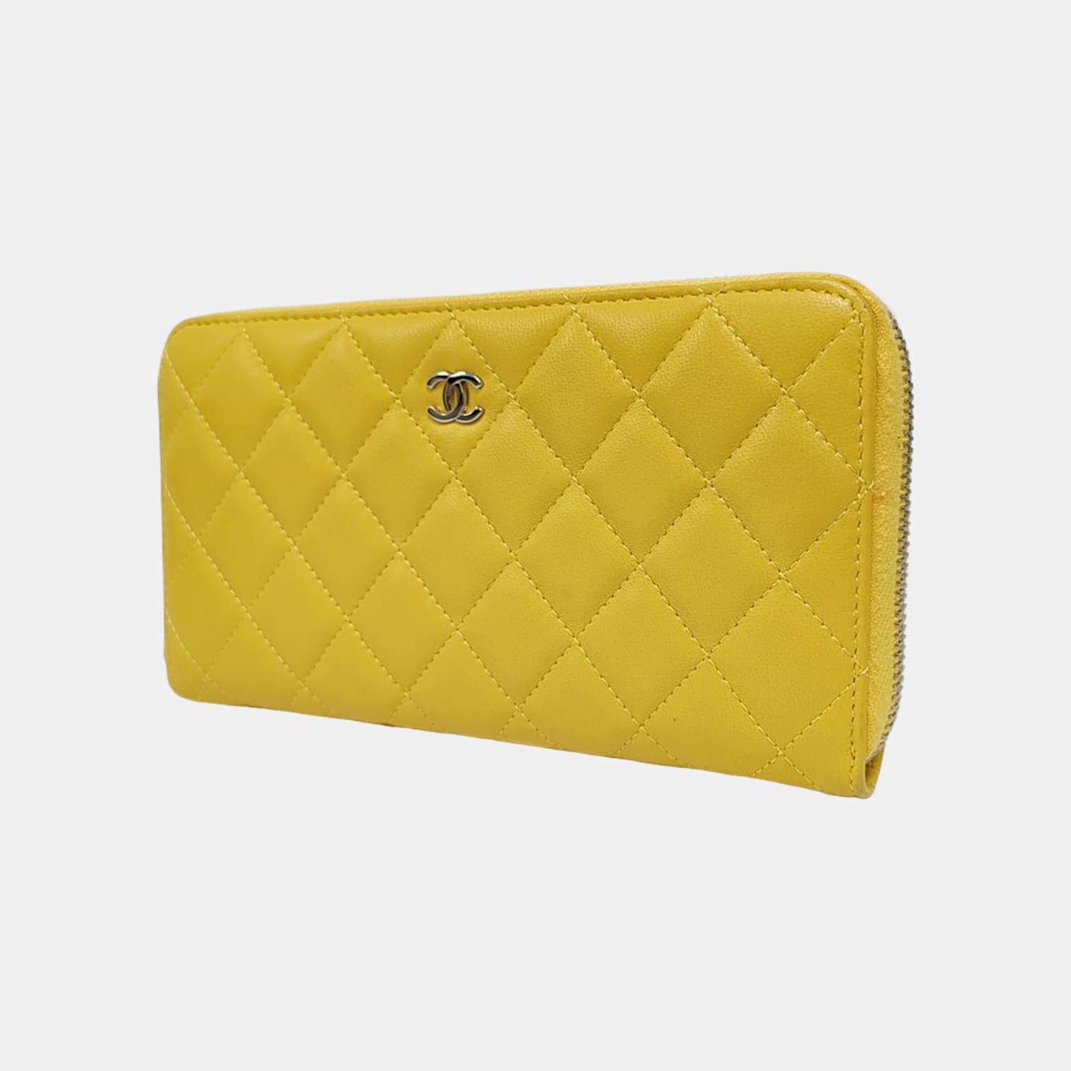 Authenticated pre-owned  WOC Quilted Lambskin Yellow Wallet - Wallet at Looply