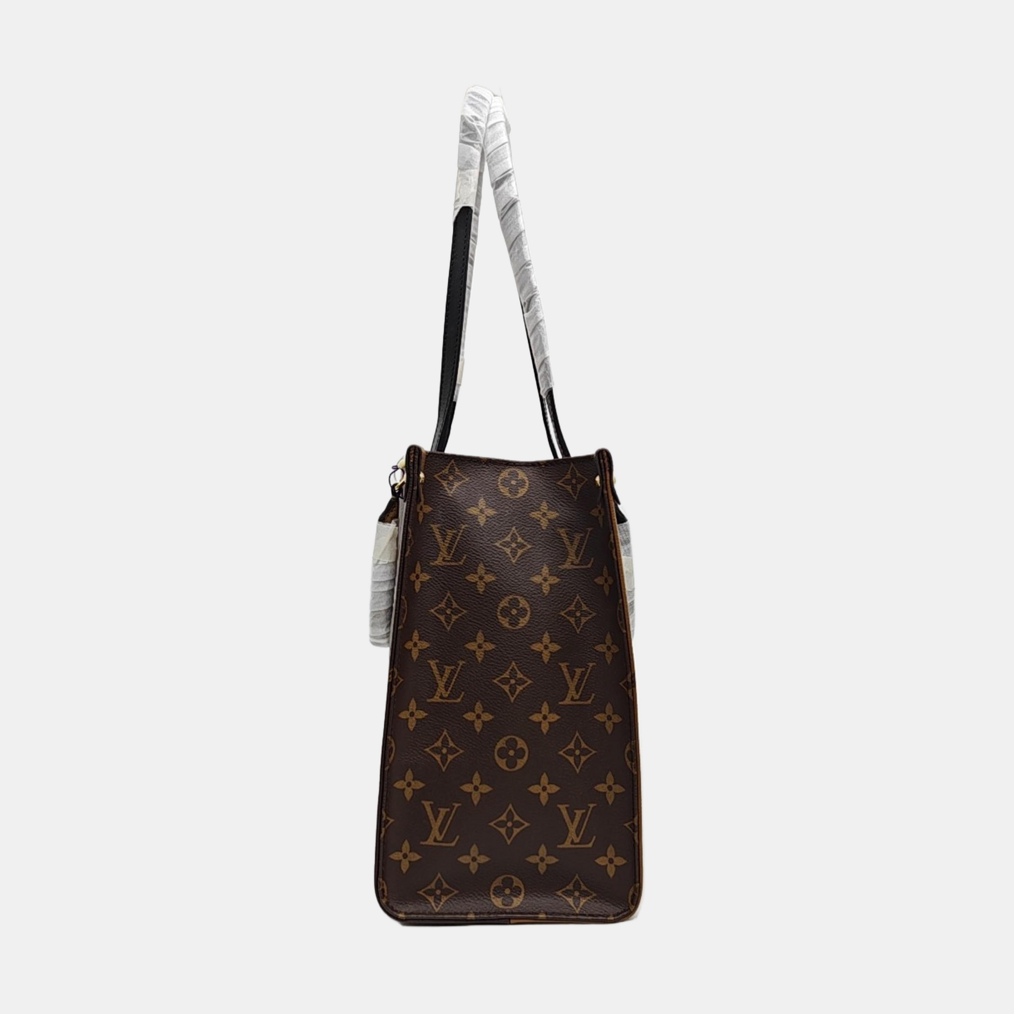 ONTHEGO MM Monogram Coated Canvas Brown