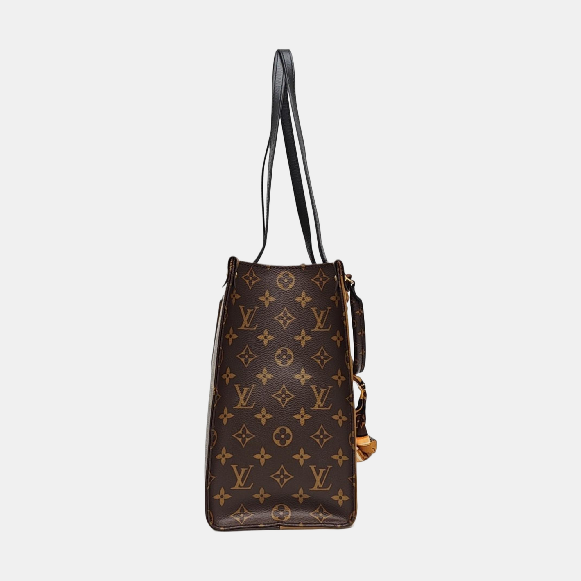 ONTHEGO MM Monogram Coated Canvas Brown