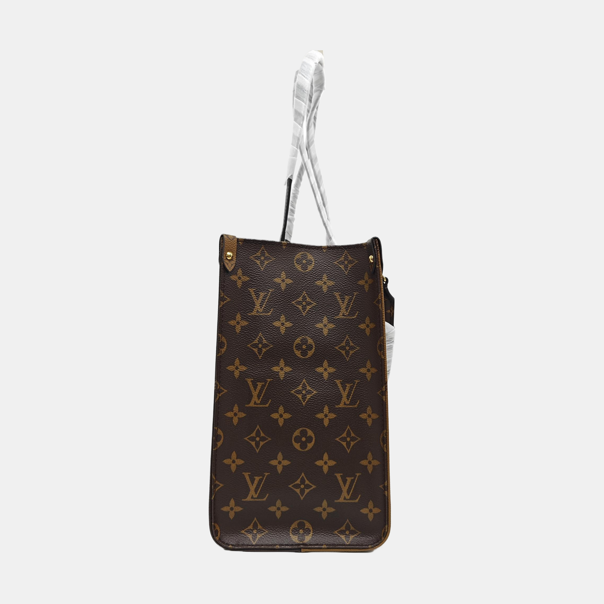 ONTHEGO MM Monogram Coated Canvas Brown