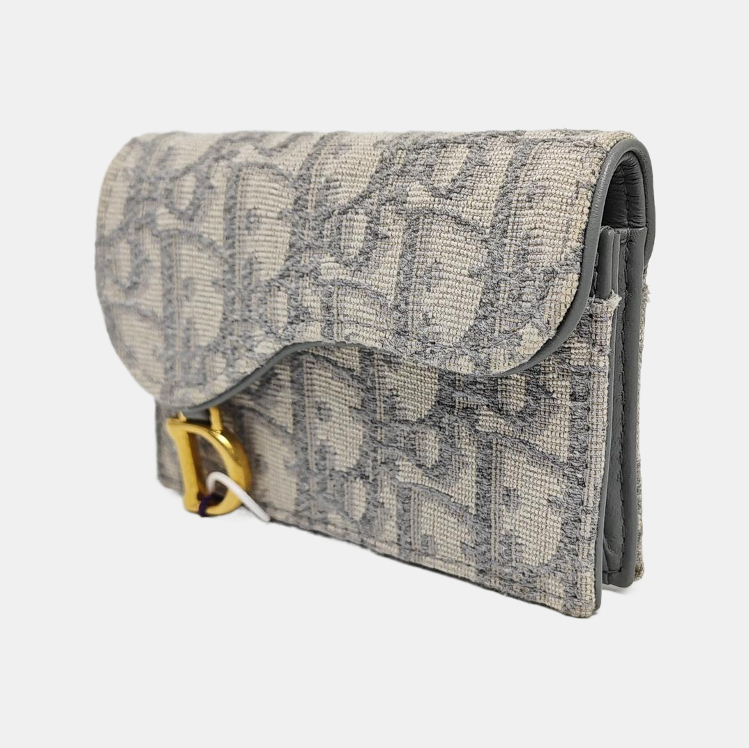 Authenticated pre-owned  Saddle Oblique Fabric Gray Card Holder - Card Holder at Looply
