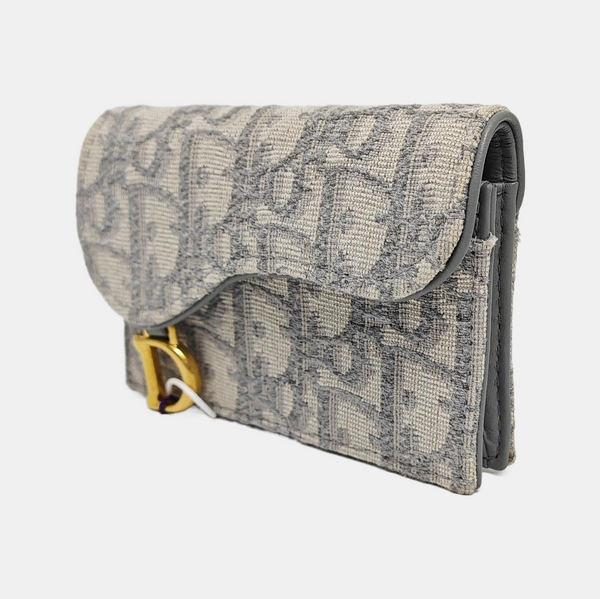 Authenticated pre-owned  Saddle Oblique Fabric Gray Card Holder - Card Holder at Looply